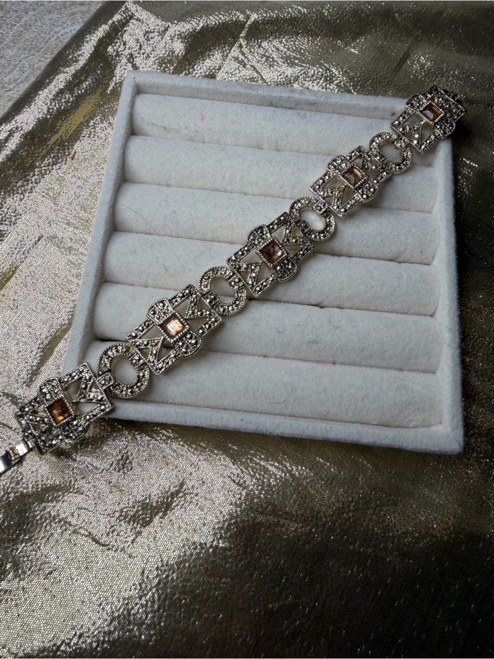 Elegant Gold-Tone Bracelet with Champagne Stones